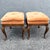 This pair of vintage Louis XV-style footstools by Drexel Heritage pairs graceful French curves with warm, inviting...