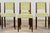 A beautifully restored set of six French Art Deco dining chairs dating to the late 1930s, sourced in France. Crafted in...