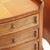 An elegant pair of French bedside tables (chevets) from the Louis-Philippe period, each with three paneled drawers and...