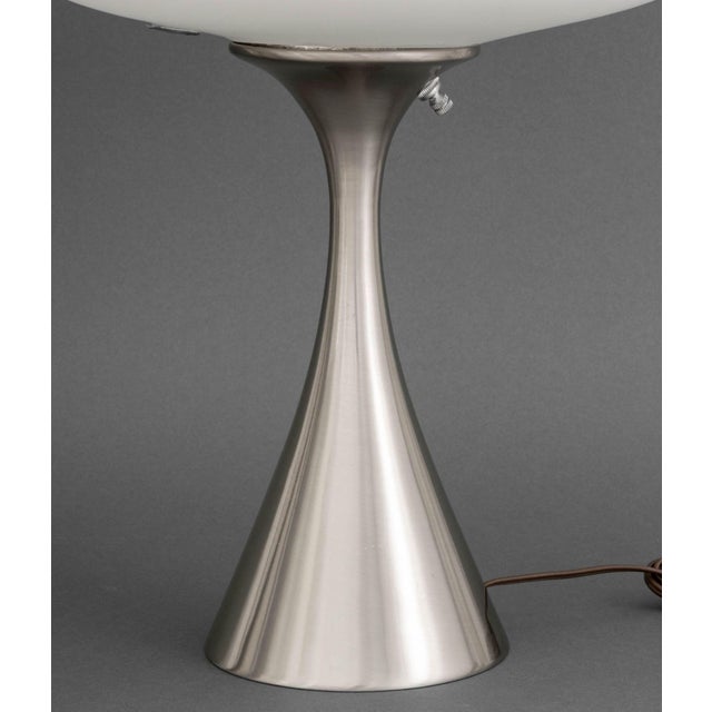 Pair of Laurel Mid-Century Modern Mushroom Table Lamps, each with frosted white glass shade above an hourglass form...