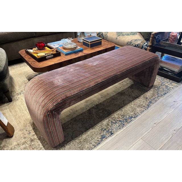 One of a kind mid-century style waterfall bench featuring a fully upholstered, seamless silhouette with softly curved ends...