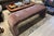 One of a kind mid-century style waterfall bench featuring a fully upholstered, seamless silhouette with softly curved ends...