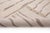 Like wind across the dunes: lines that drift, break, and begin again. Fine light taupe lines run horizontally across a...