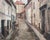 Baroque 19th Century European Old Town Street Scene with Figure, Oil Painting in Ornate Gilt Frame For Sale - Image 3 of 9