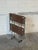 This space-saving rolling bar cart features a tubular frame supporting two tiers of trays for entertaining. Its smooth...