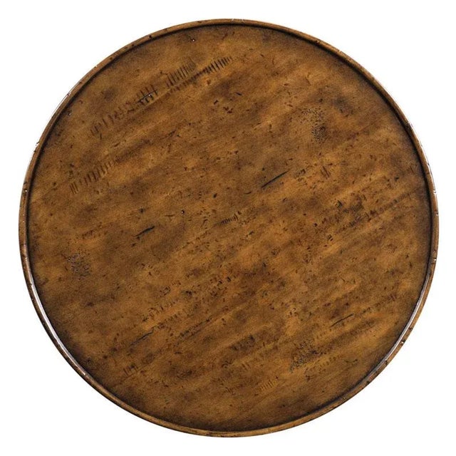 A galleried hand planed round planked cherry top rests over six curvaceous legs. The legs are joined by a low hand planed...