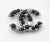 This is part of Chairish’s Costume Jewelry assortment. Chanel Gunmetal CC Black White Bead Brooch * Marked 03 * Made in...