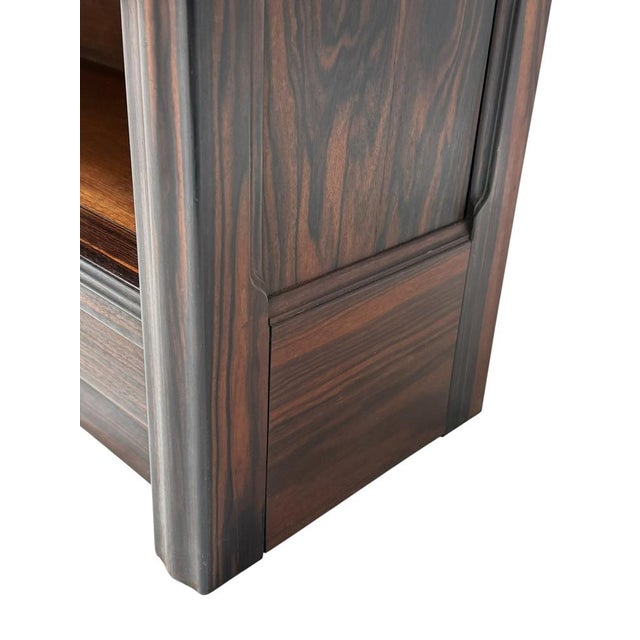 Stunning and elegant Art Deco Amsterdamse School open bookcase. Solid macassar ebony base with three original oak shelves....