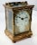 Lovely brass and glass carriage clock by C.R. Crookshank for Tiffany & Co. Made in France in the 20th century. Adorned...