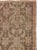 This mid-20th-century Turkish Anatolian accent rug presents a dense allover botanical pattern across a softly variegated...