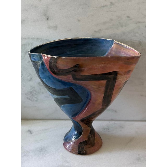Vintage post modern hand painted ceramic pedestal vase featuring bold, abstract brushstrokes in blue, black and peach...