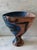Vintage post modern hand painted ceramic pedestal vase featuring bold, abstract brushstrokes in blue, black and peach...