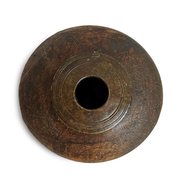 Antique old wooden tobacco container from India. Adorned with brass / metal decorative details. Each is unique and sold...