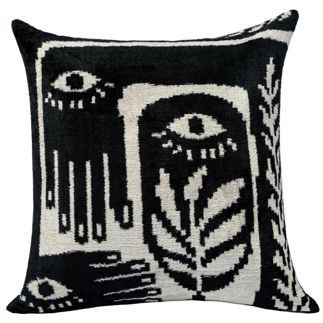 "Make a bold statement in your home decor with this handmade velvet throw pillow, featuring a striking black and white...