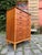 A classic example of Danish craftsmanship and timeless elegance: This teak chest of drawers from the 1960s brings the...
