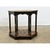 A wooden English hexagonal coffee or end table has been recently updated with new paint of ebonized effect and pasted...