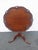 This classic Tilt Top Table is made out of wood, solid mahogany, and it has red brown mahogany stain finish color. it was...