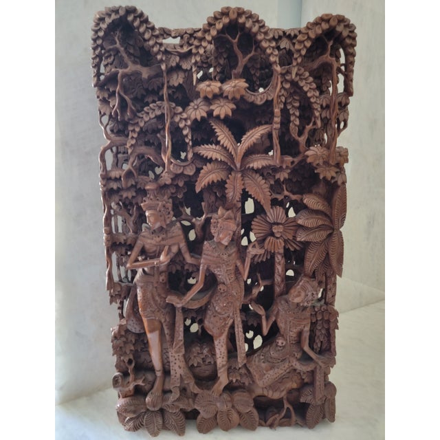 A vintage, sophisticated, and very detailed hand carved wooden wall panel from Bali, Indonesia. Beautiful, intricate work....