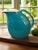 The Vintage Mid-Century Modern American Hall Ocean Blue Pitcher is a stylish and retro-inspired piece perfect for all...