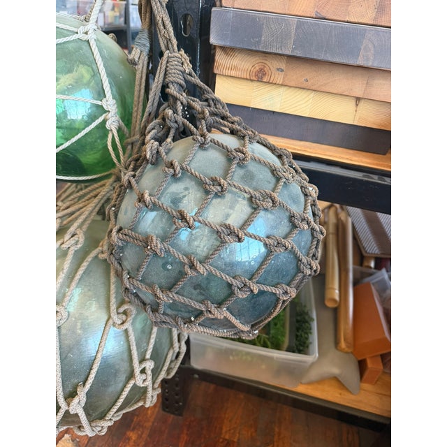 Antique Japanese Glass Fishing Floats – Hand‑Blown Green Glass With Rope Netting For Sale - Image 4 of 6