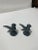 Pair of cast iron bird with a beautiful amount of patina. The main color is gray with some blue detailing. Maker is...