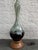 Very large ceramic lamp with a beautiful greenish blue drip glaze finish over a very dark brown base that looks black....