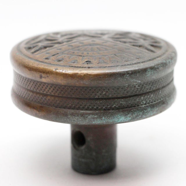 This Vernacular style entry bronze door knob was made by Branford in the 1886 catalog. It is part of the B-11710 Oriental...