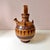 A stunning handcrafted mid-century clay pottery water jug, made in Mexico. With gorgeous hand painted detailing...