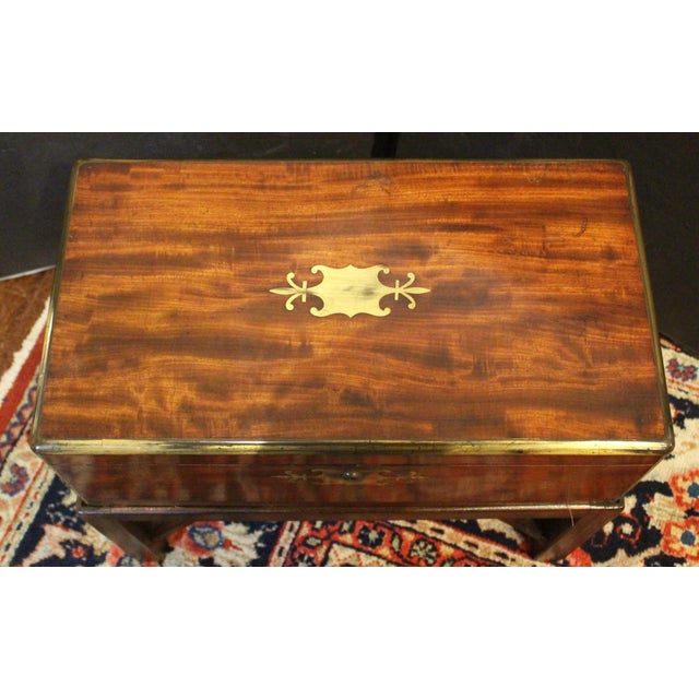 Early-mid 19th century English large campaign lap desk now on custom made side table stand. Mahogany, also incorporating...