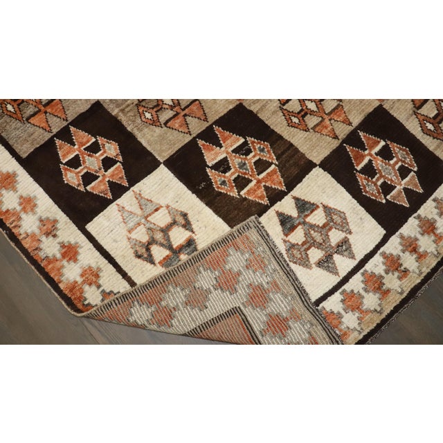 a 2nd quarter of the 20th century Persian Gabbeh old square rug with an all-over design in earth tones Details rug no....
