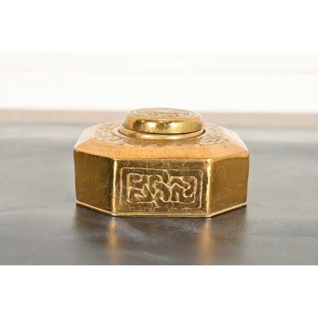 A gorgeous Arts & Crafts or Art Deco period "Zodiac" pattern gilt bronze inkwell By Tiffany Studios (signed to the...