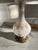 Add style to any room with this Vintage milk glass lamp trimmed with fine gold French detailing. Intricate filigree bronze...