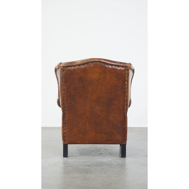 Vintage Leather Wing Chair with Red Corduroy Seat Cushion For Sale - Image 4 of 14