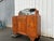 Elegant French Art Nouveau sideboard dating from the early 20th century, crafted in solid wood and richly carved with...