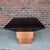 This is a beautiful custom studio made game table with a black finished top and copper inlays with a tiered copper...
