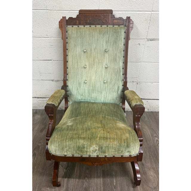 This is a stunning antique Victorian Eastlake walnut platform rocking chair dating to approximately 1880–1900. The walnut...