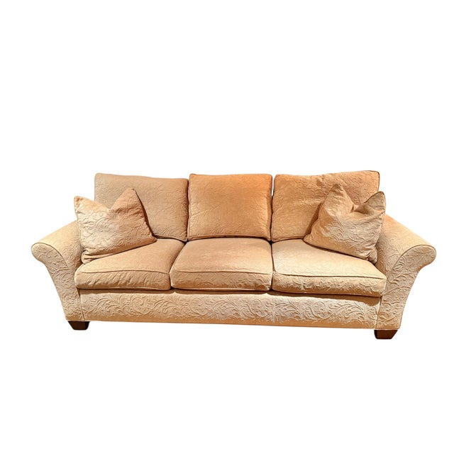 Stickley three-seat sofa with two matching pillows featuring graceful curved arms, loose back and seat cushions, solid...