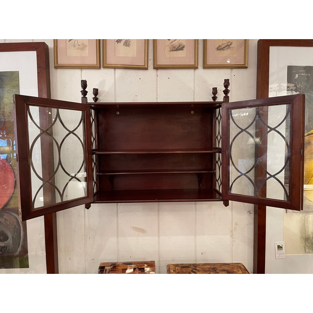 Beautiful Regency style antique mahogany & glass wall vitrine having two interior shelves and working key.