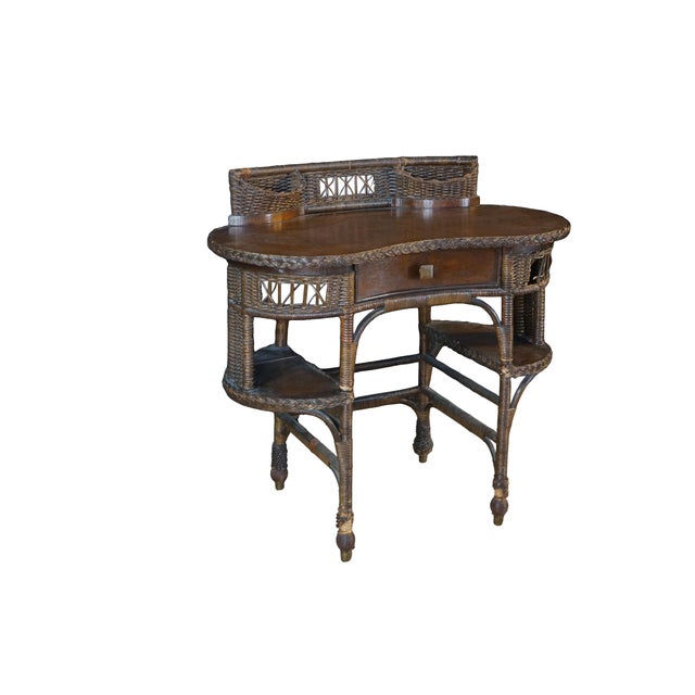 An exceptional and rare example of early 20th-century American furniture, this petite writing desk or dressing table...