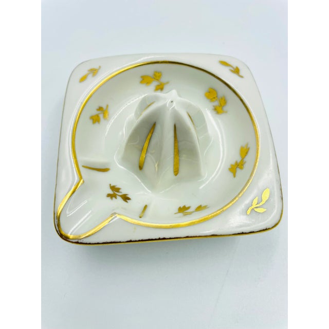 This charming and exquisite petite Limoges, France "Citrus Press" is Hand-Painted with gold leaf detail. The delicate...
