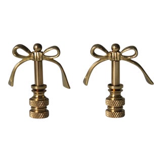 Brass Bow Finials - A Pair For Sale