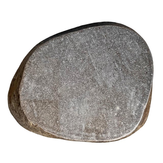 Solid heavy stone boulder vintage outdoor side table or stool. This rustic organic modern piece will look beautiful and...