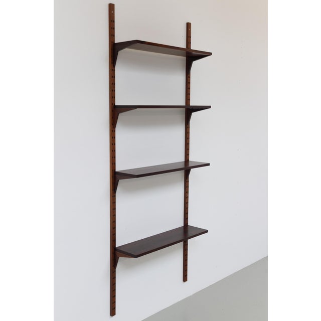 Danish Rosewood Wall Unit by Poul Cadovius for Cado 1960s. Danish Mid-Century Modern 1 bay shelving system model Cado....