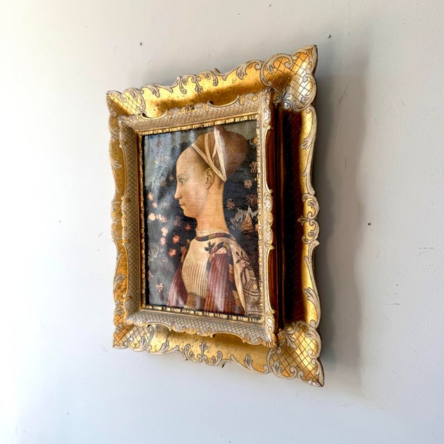 Vintage gothic renaissance style custom carved gilt wood double frame with a print of Antonio Pisanello's "Portrait of...