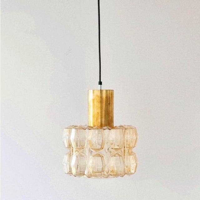 Large mid-century pendant/ceiling light by helena tynell for limburg (germany, 1960s). The amber/champagne colored hand...