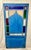 A remarkably decorative antique architectural salvage door featuring a striking Moorish-inspired silhouette, vibrant...