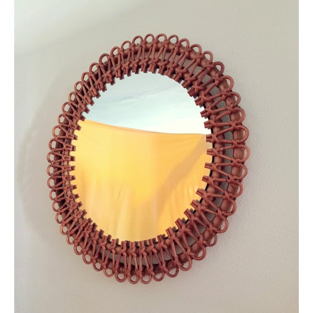 This rattan mirror is attributed to Franco Albini for form and style. No damages. 100% original without defects. Original...