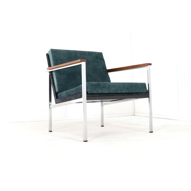 This elegant armchair, model 1453, was designed in the 1960s by Coen de Vries for the Dutch furniture company Gispen. Both...