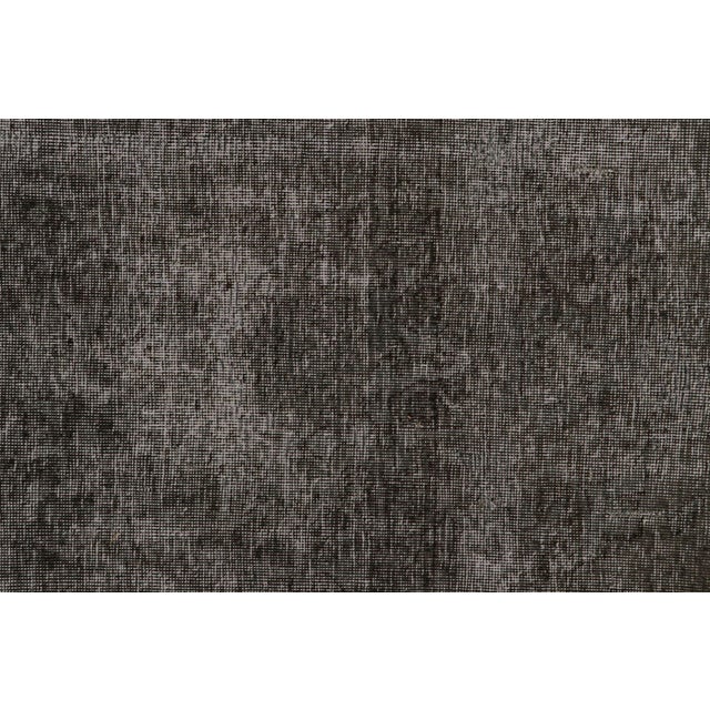 From our new collection of overdyed rugs, a vintage 8x11 Persian rug originating circa 1970-1980 or possibly earlier. On...
