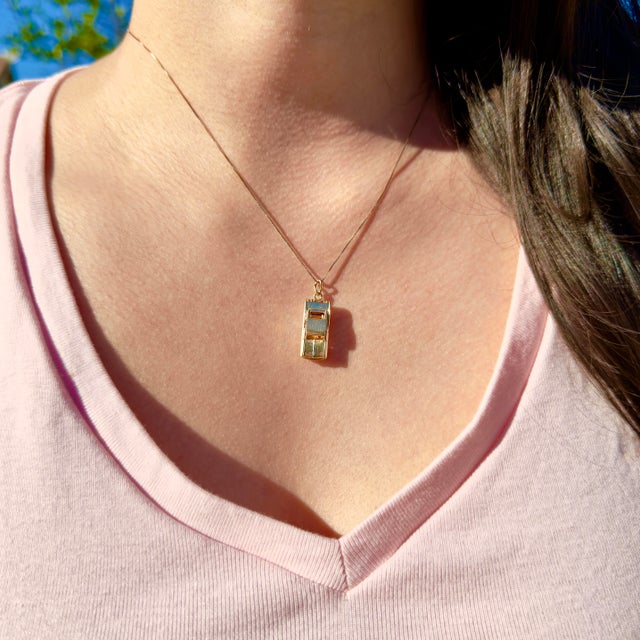 About This Charm: This 1960s 14K gold car charm captures the golden age of American automobiles with fully articulating...